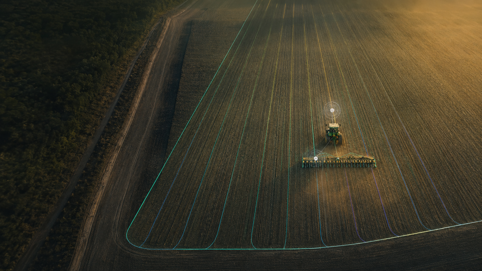 Wide aerial field view with tractor and guidance line overlays